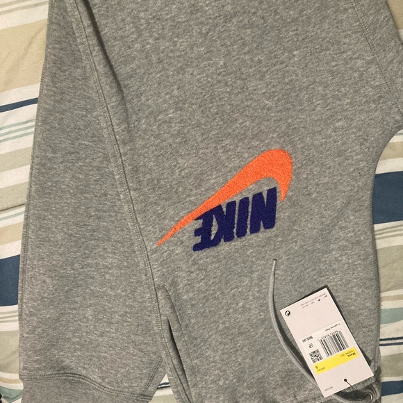 Nike Heather Gray Joggers with Vibrant Orange and Deep Blue Logo - Picture 1 of 2